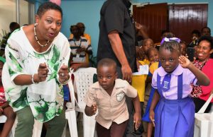 Jamaica's Sports Minister Olivia Grange shared a light moment with some of the entrants in this year’s INSPORTS Basic School Athletics Championships at the launch. The Championship will be held at the National Stadium from June 13-15.