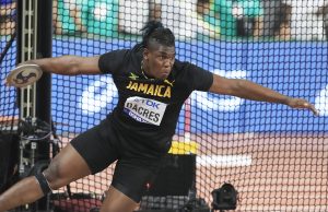 Dacres wins historic silver medal in men’s discus