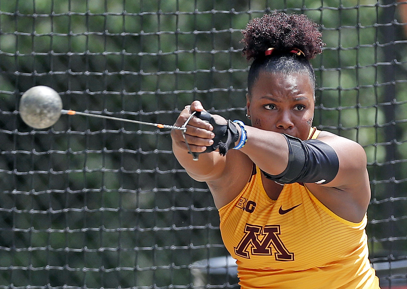 Nayoka Clunis' 20.98m throw gave her third in the women's weight throw event
