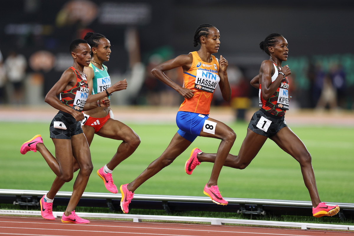 Sifan Hassan of Team Netherlands and Faith Kipyegon of Team Kenya compete in the Women's 5,000m Final during day eight of the World Athletics Championships Budapest 2023 at National Athletics Centre on August 26, 2023 in Budapest, Hungary. (Photo by Christian Petersen/Getty Images for World Athletics)