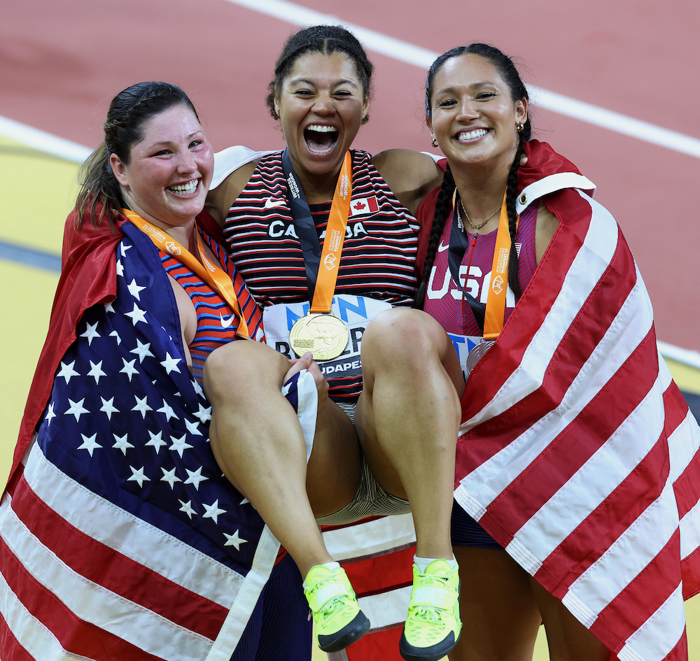 (L to R) Bronze medalist Deanna Price of Team United States, gold medalist Camryn Rogers of Team Canada and silver medalist Janee' Kassanavoid of Team United States pose for a photo after the Women's Hammer Throw Finalduring day six of the World Athletics Championships Budapest 23